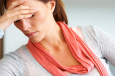 stressed woman in need of Osteopathy